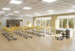 Teacher Desk with Pedestal and Polyurethane Edge in an interior setting